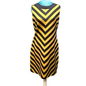 Elegant dress from ILE New York, size 8, striking Navy and gold chevron pattern